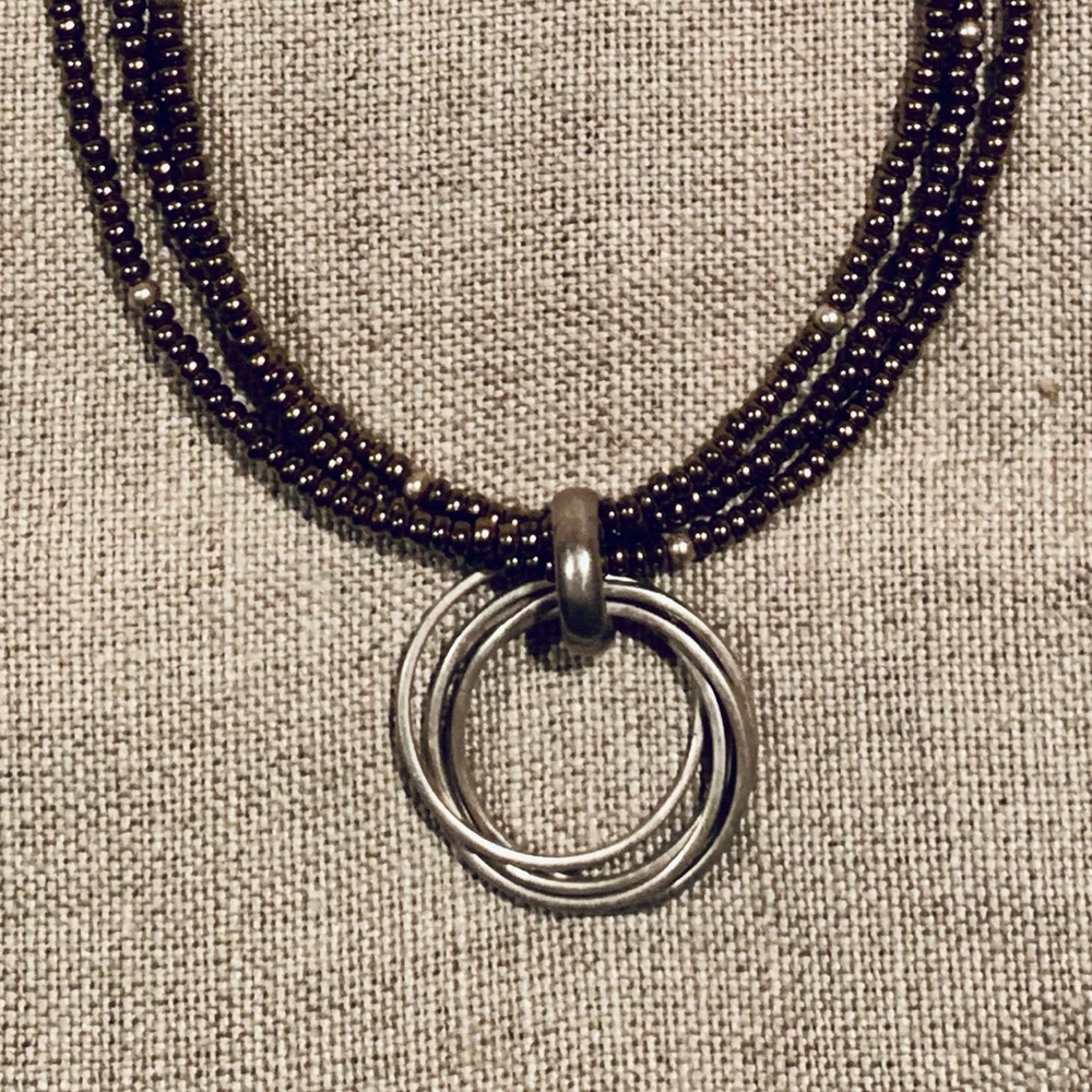 Silpada .925 Sterling Silver Five Ring Intertwined Circle Pendant S1637